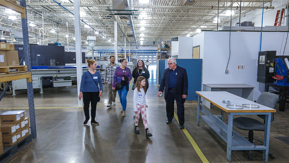 Hirsh employees show their friends and family their new headquarters