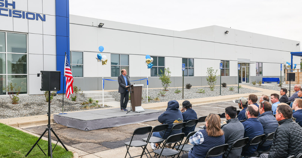 Governor Jared Polis speaks at Hirsh Precision's grand opening ceremony